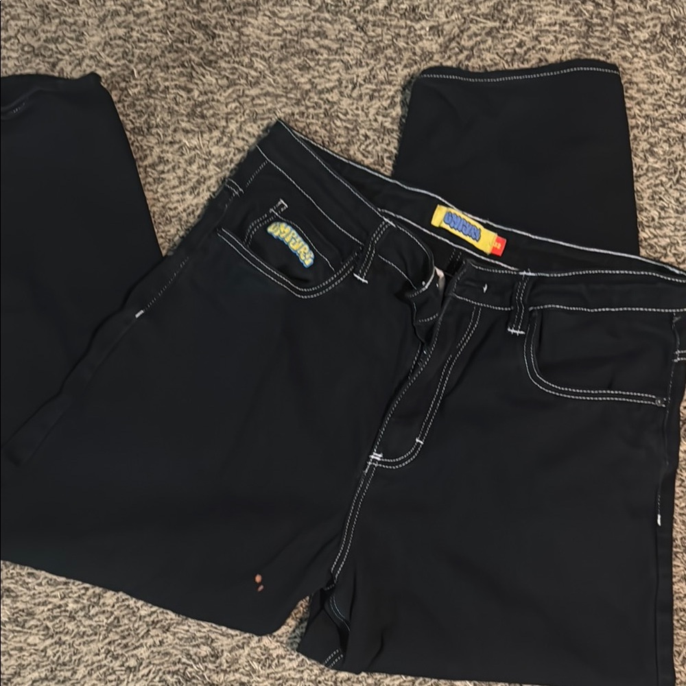 Black Empyre spray paint pants